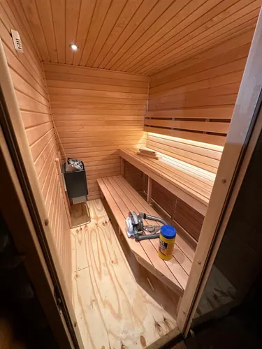 Cedar lining, tiered benches and corner heater with bench LED strip lit
