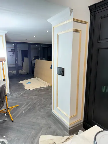 Boxed column with control panel fitted, mouldings still bare timber