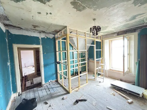 Studwork for the en-suite with membrane fitted and cables run